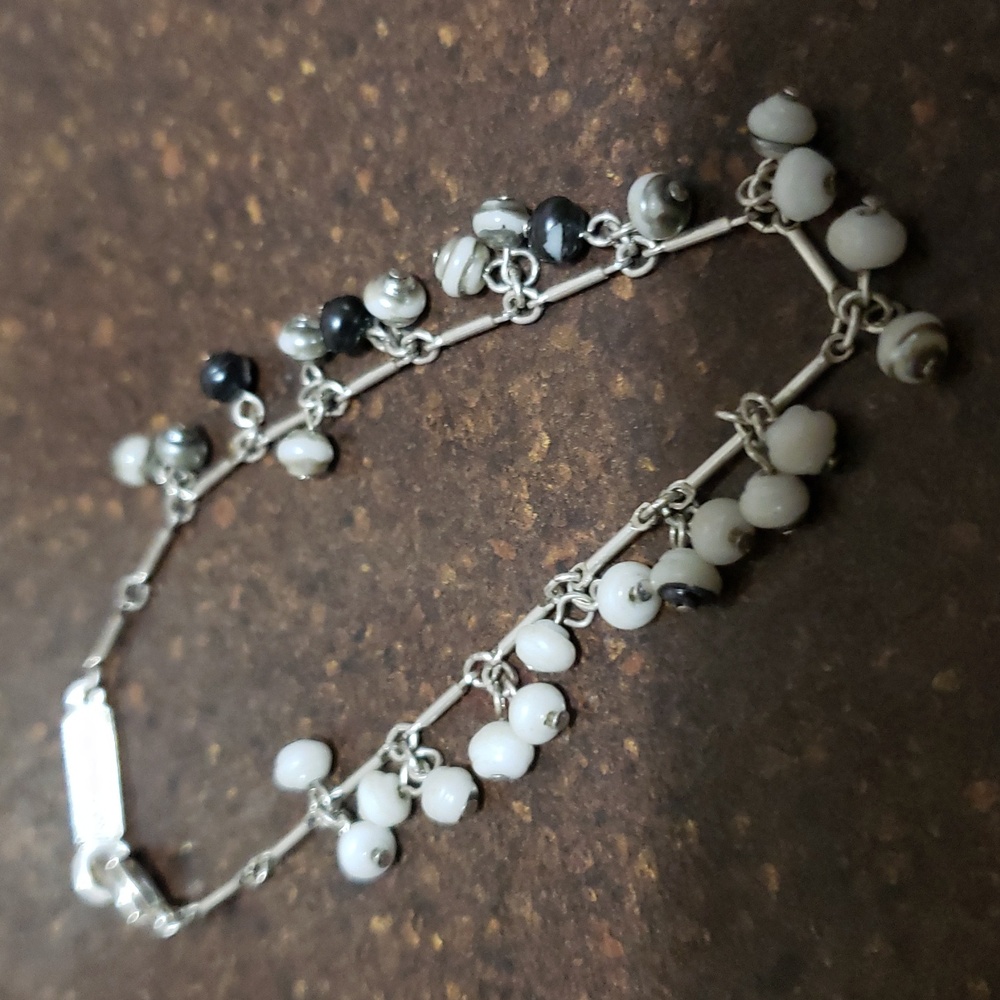 Napier silvertone and faux pearl bracelet.